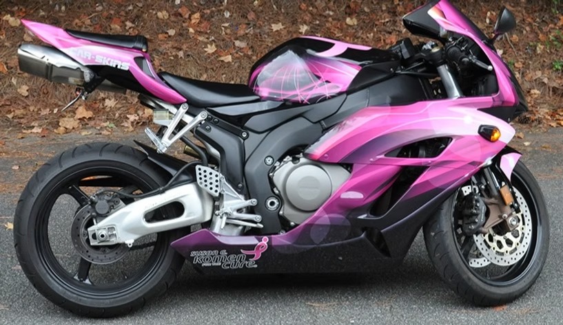 Sport motorcycle with pink and black graphic bodywork