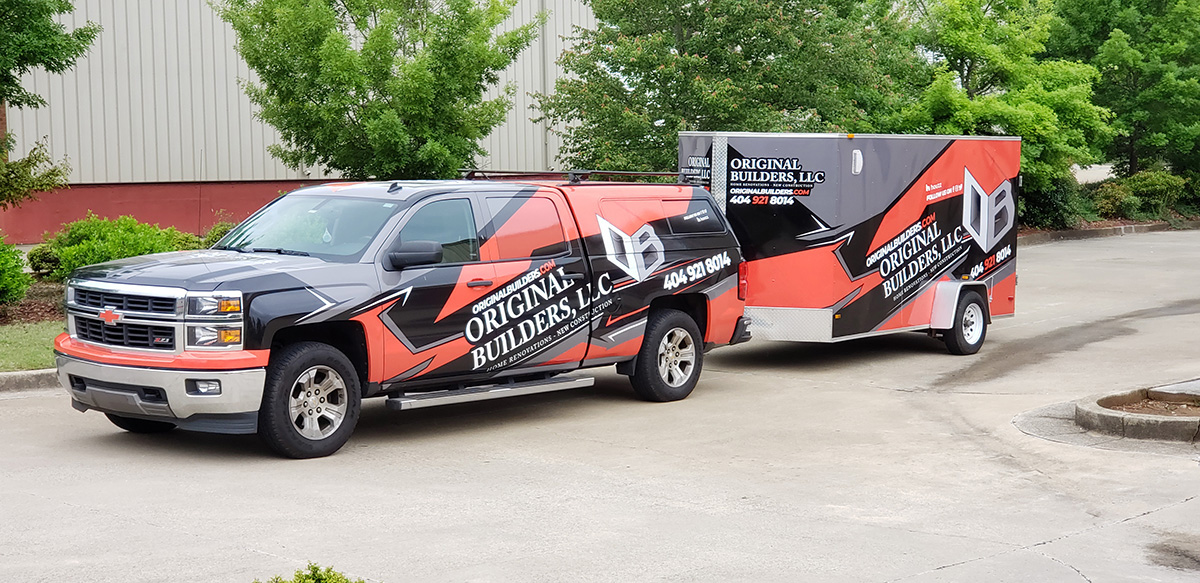 Original Builders pickup and enclosed trailer with matching red, gray, and black graphics.